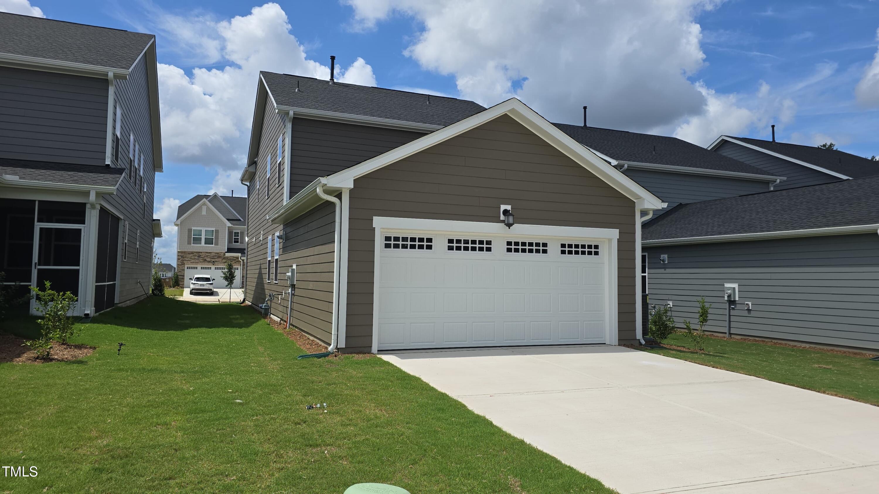 409 Cresting Wave Drive Wake Forest, NC 27587 - Photo 27 of 31 a view of a house with a yard