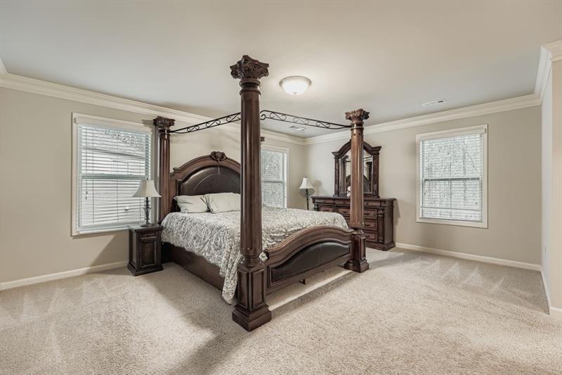 122 Prospect Lane Dallas, GA 30157 - Photo 14 of 34 a bedroom with a bed and a window