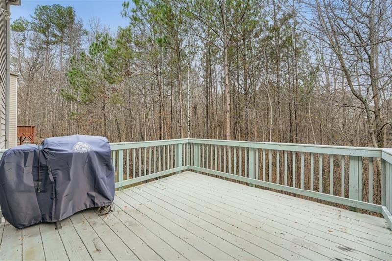 122 Prospect Lane Dallas, GA 30157 - Photo 27 of 34 a view of deck and deck with wooden floor and fence