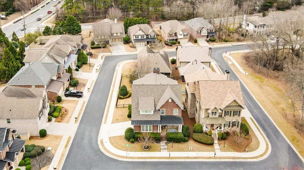 3440 Rialto Place Alpharetta, GA 30022 - Photo 2 of 66 an aerial view of a house with a swimming pool