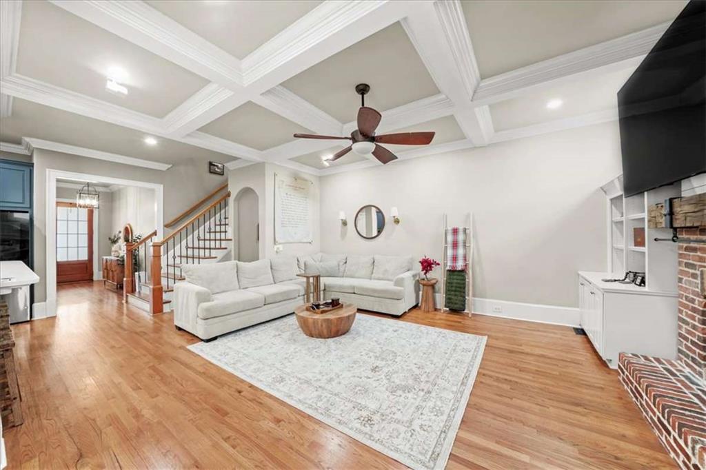 3440 Rialto Place Alpharetta, GA 30022 - Photo 21 of 66 a living room with furniture and a wooden floor