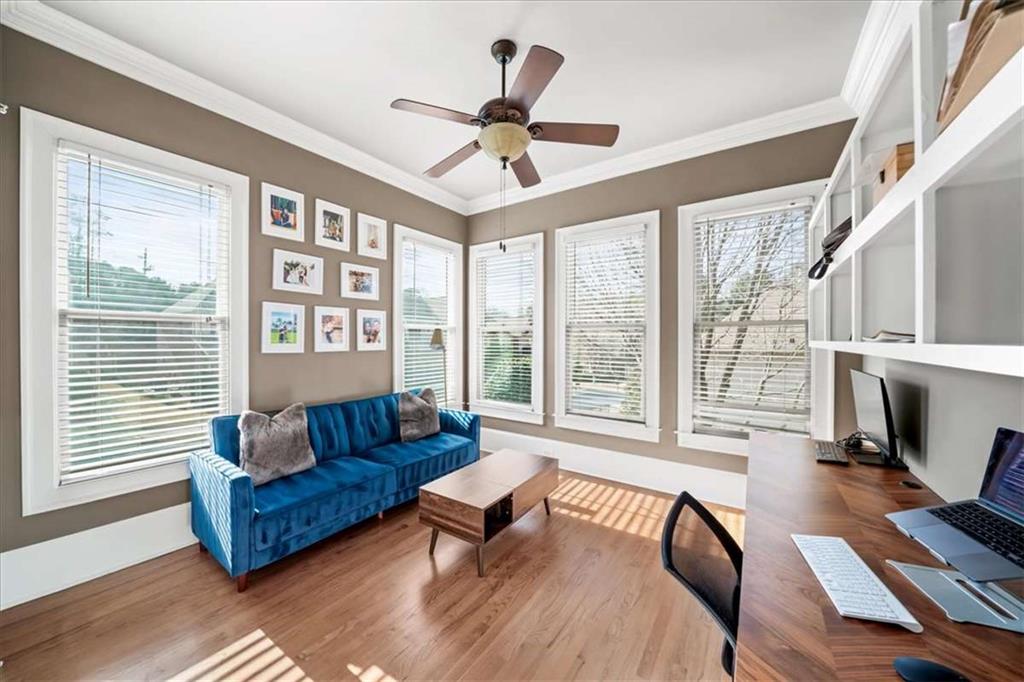 3440 Rialto Place Alpharetta, GA 30022 - Photo 24 of 66 a living room with furniture and a large window