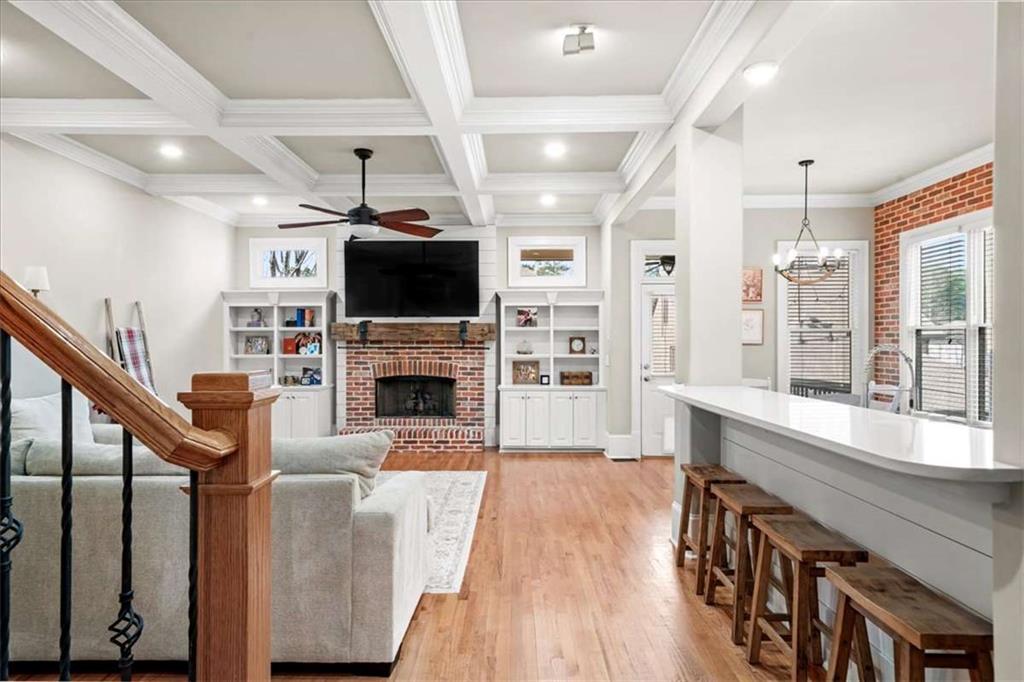 3440 Rialto Place Alpharetta, GA 30022 - Photo 26 of 66 a living room with furniture fireplace and flat screen tv