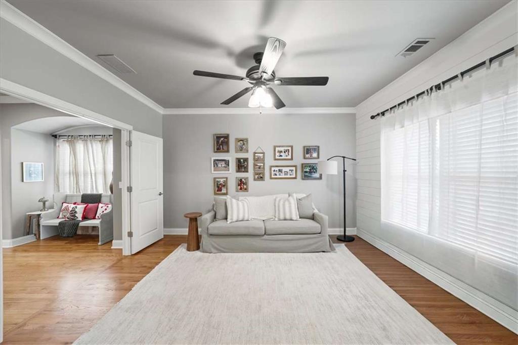 3440 Rialto Place Alpharetta, GA 30022 - Photo 31 of 66 a living room with furniture and white walls