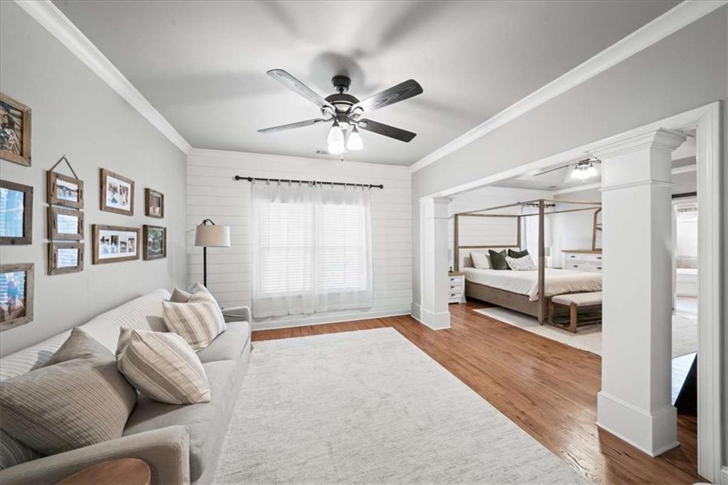 3440 Rialto Place Alpharetta, GA 30022 - Photo 32 of 66 a living room with furniture and a large window