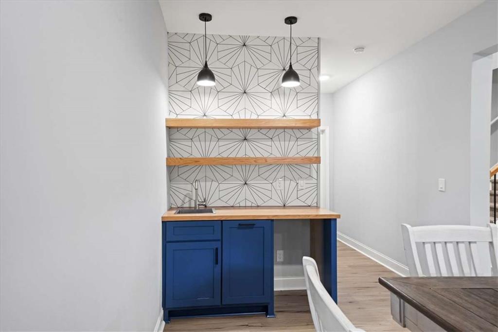 3440 Rialto Place Alpharetta, GA 30022 - Photo 43 of 66 a view of dining room with wooden floor