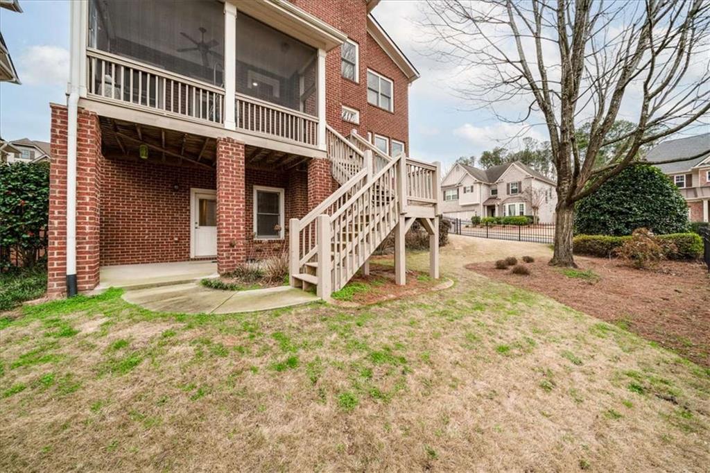 3440 Rialto Place Alpharetta, GA 30022 - Photo 56 of 66 a view of a house with a yard