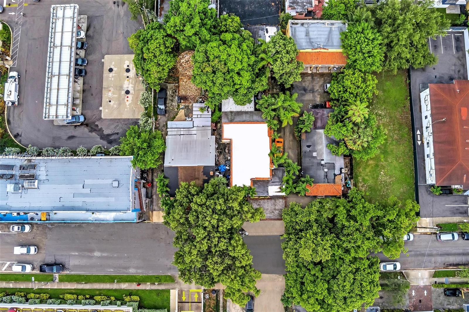 1228 Southwest 2nd Street Miami, FL 33135 - Photo 11 of 18 an aerial view of a house with a yard and garden