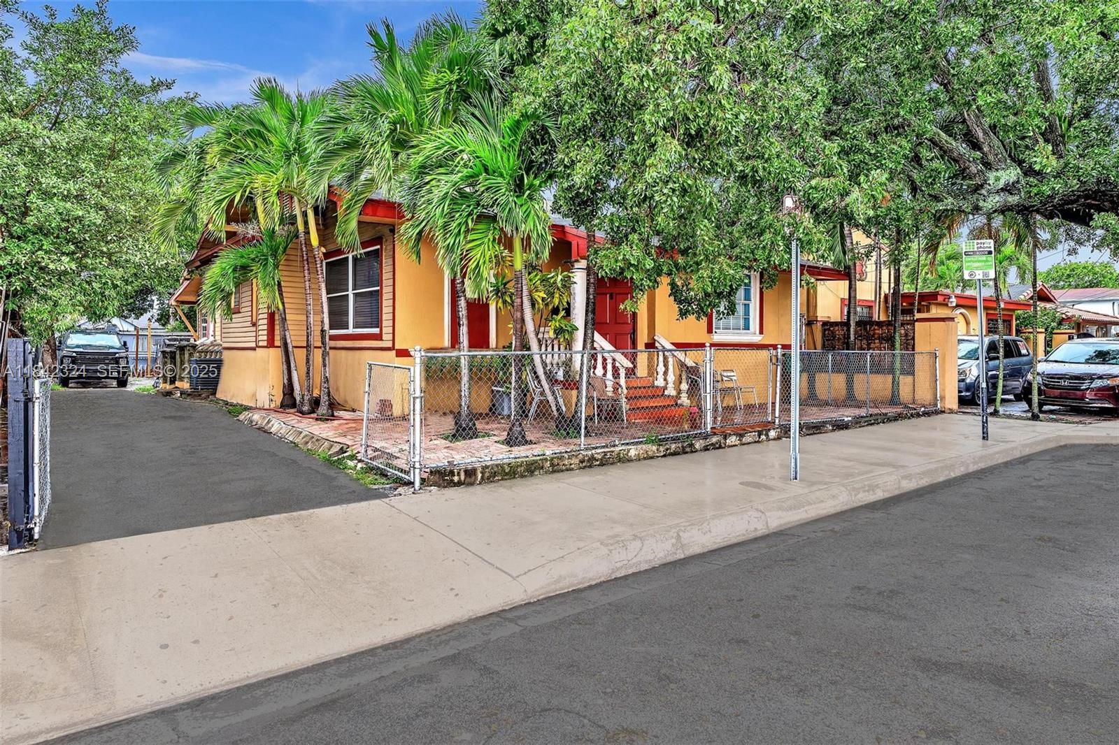 1228 Southwest 2nd Street Miami, FL 33135 - Photo 6 of 18 front view of a building with a fountain