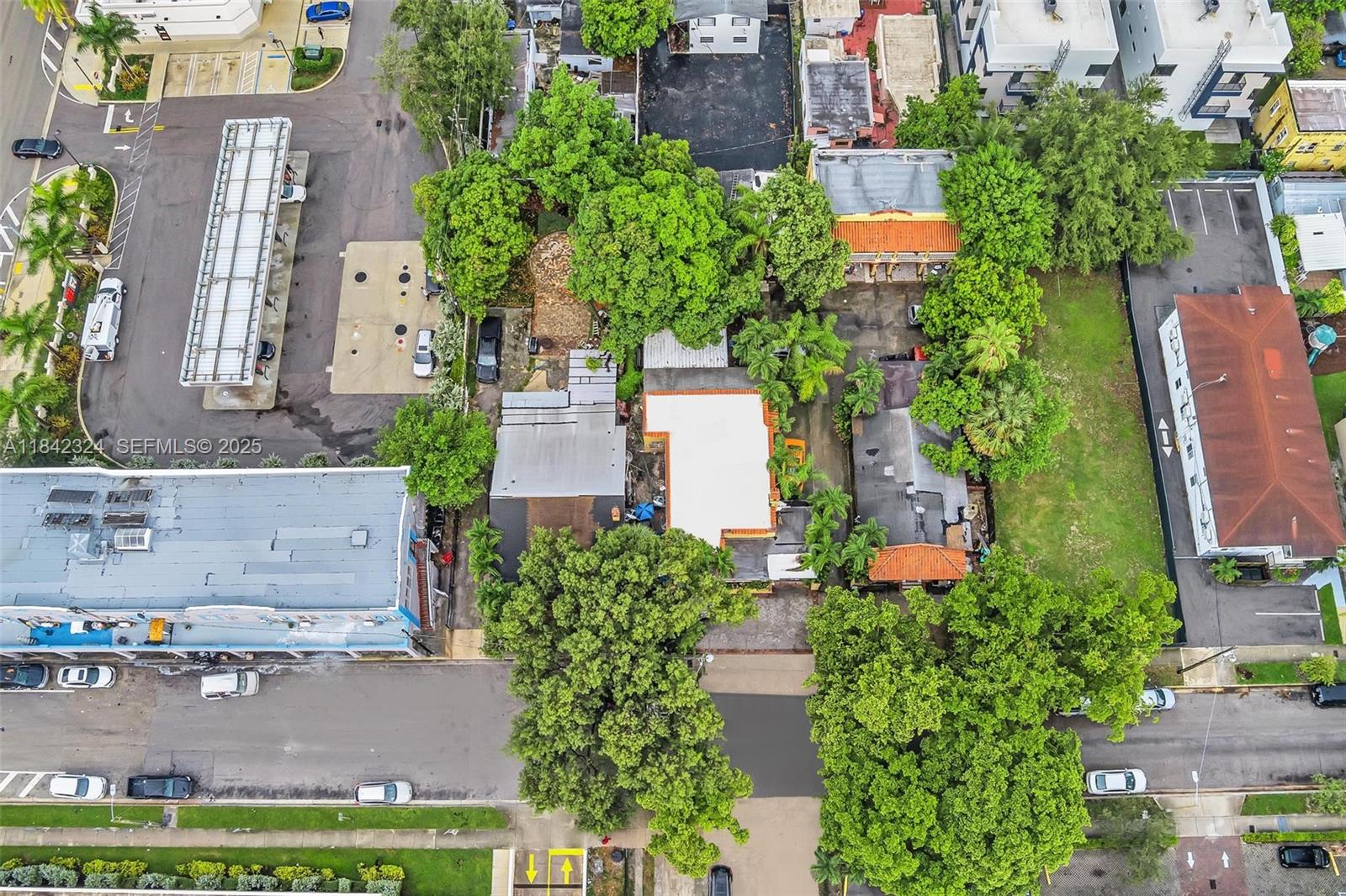 1228 Southwest 2nd Street Miami, FL 33135 - Photo 7 of 18 an aerial view of a house with a yard and garden
