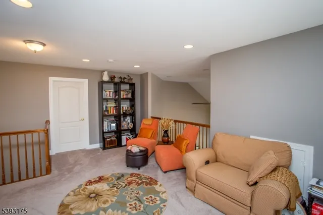 a bedroom with furniture and window