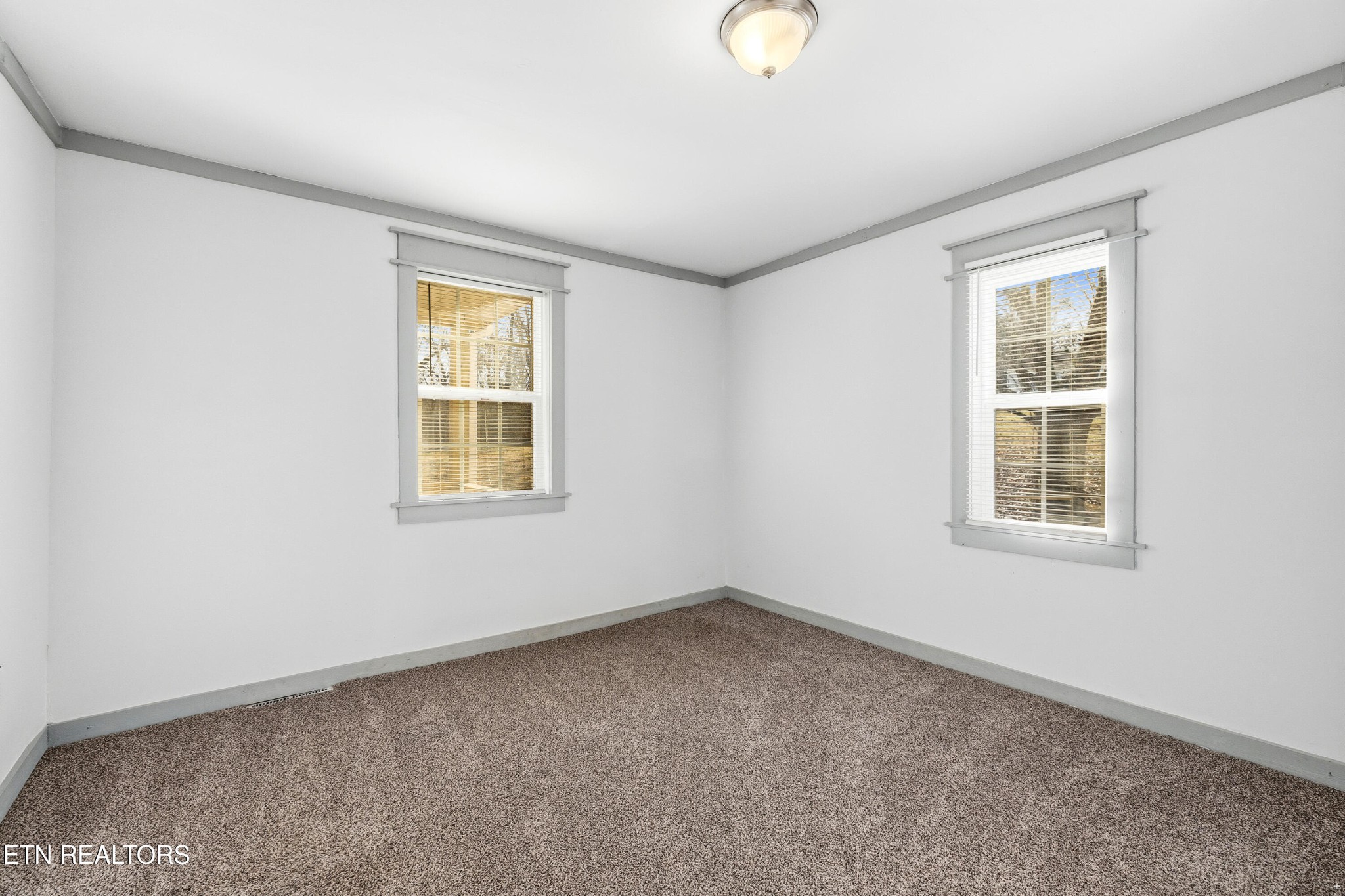 2438 Southside Road Knoxville, TN 37920 - Photo 16 of 21 an empty room with windows