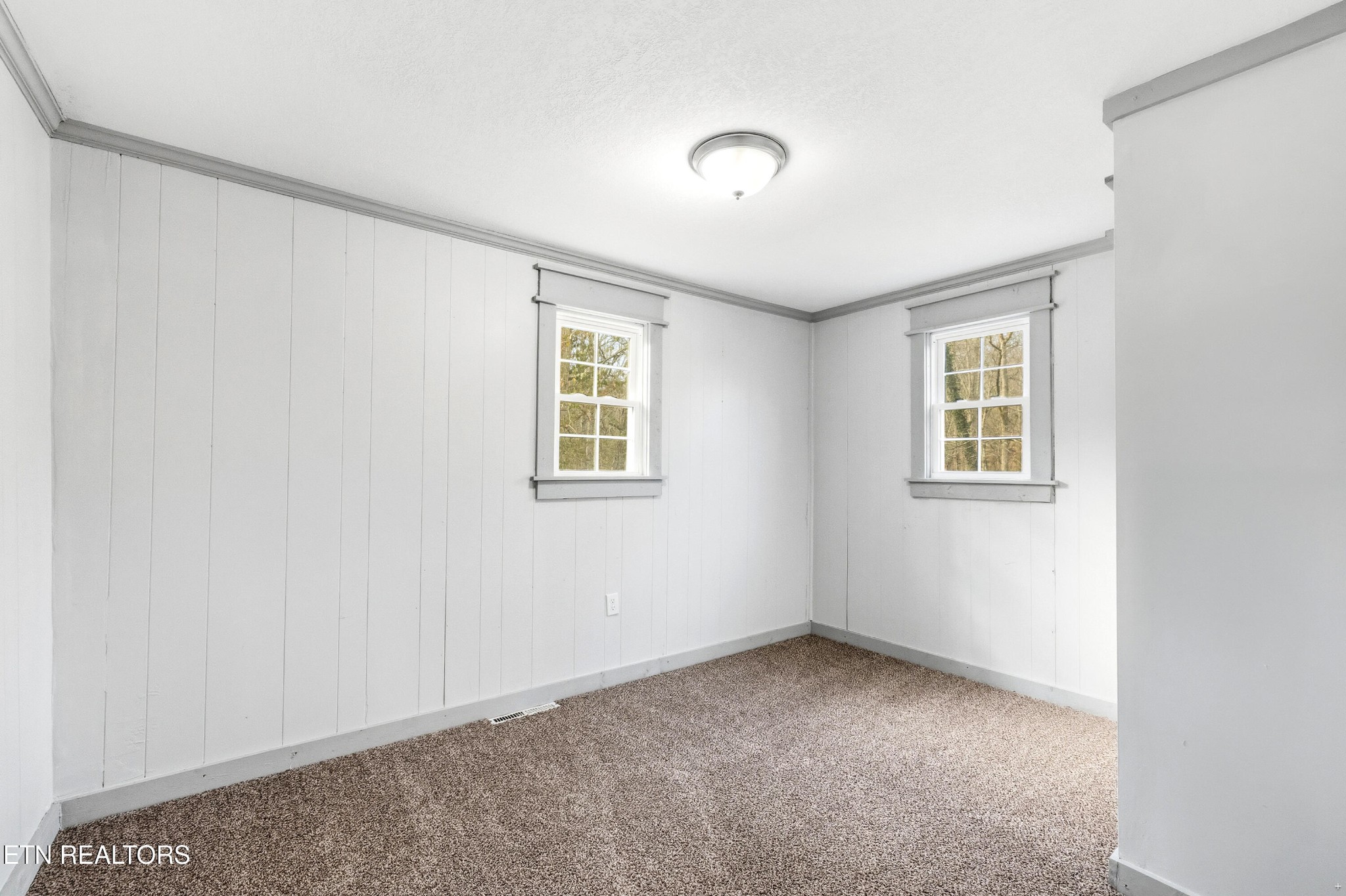 2438 Southside Road Knoxville, TN 37920 - Photo 17 of 21 an empty room with windows