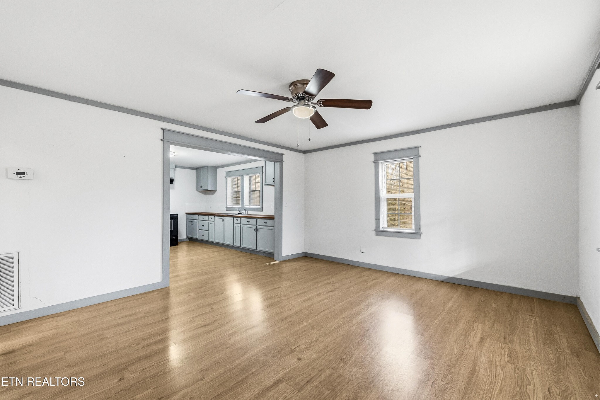 2438 Southside Road Knoxville, TN 37920 - Photo 5 of 21 wooden floor in an empty room with a window