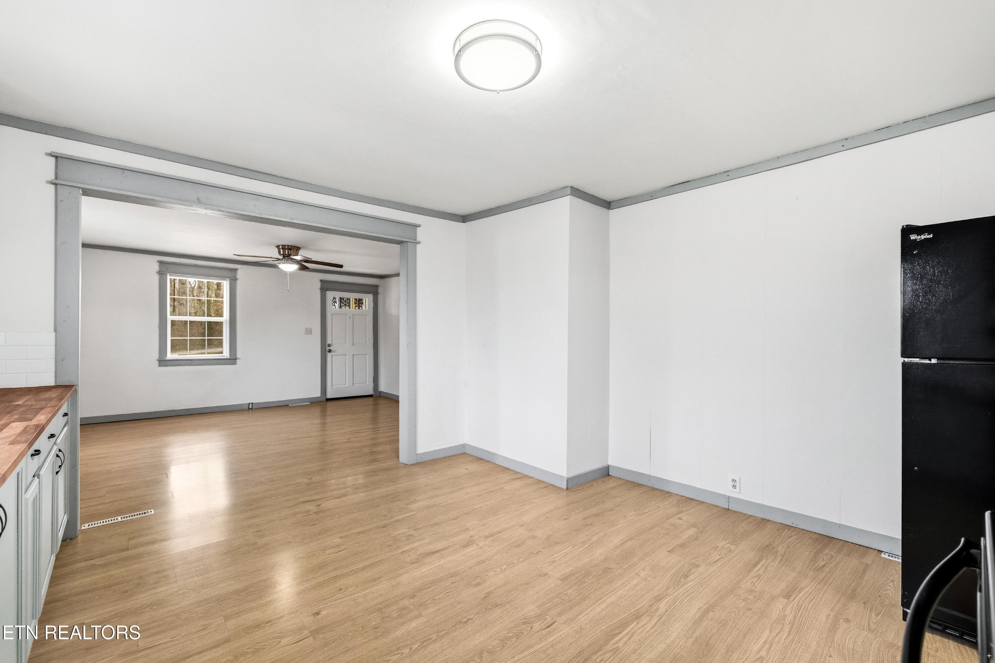 2438 Southside Road Knoxville, TN 37920 - Photo 8 of 21 a view of empty room with wooden floor and fan