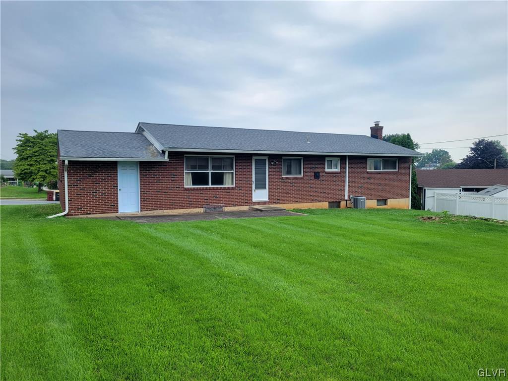 1312 5th Street Whitehall, PA 18052 - Photo 27 of 29 a front view of house with yard
