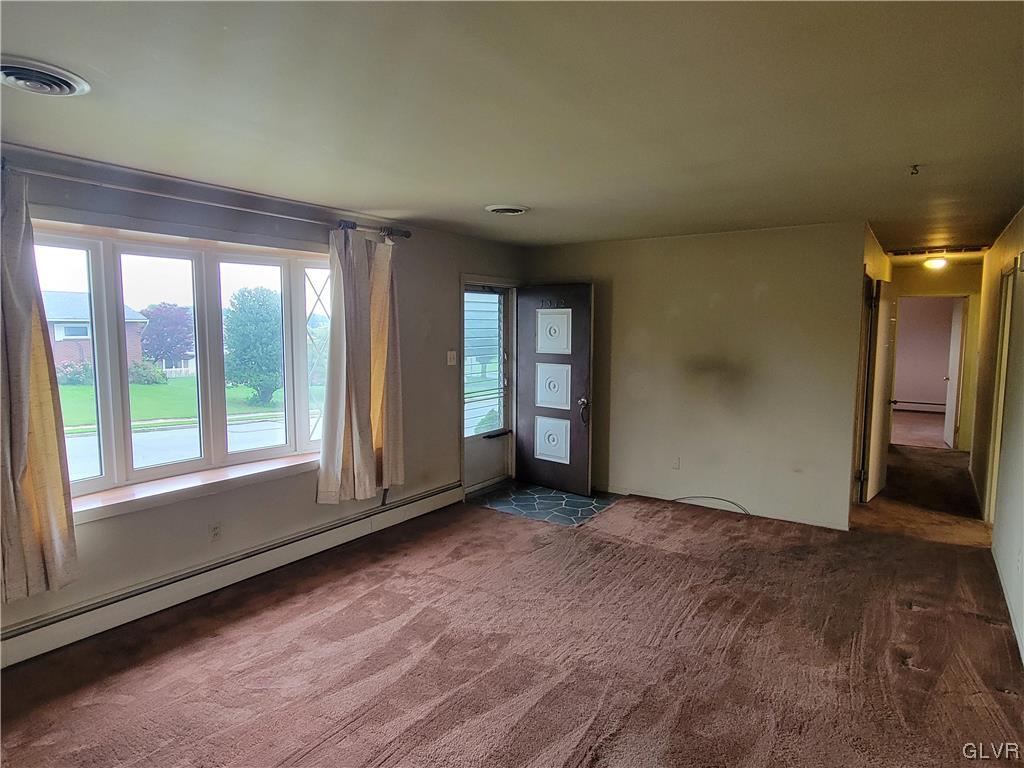 1312 5th Street Whitehall, PA 18052 - Photo 5 of 29 an empty room with windows