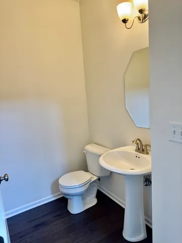 a bathroom with a sink and a toilet