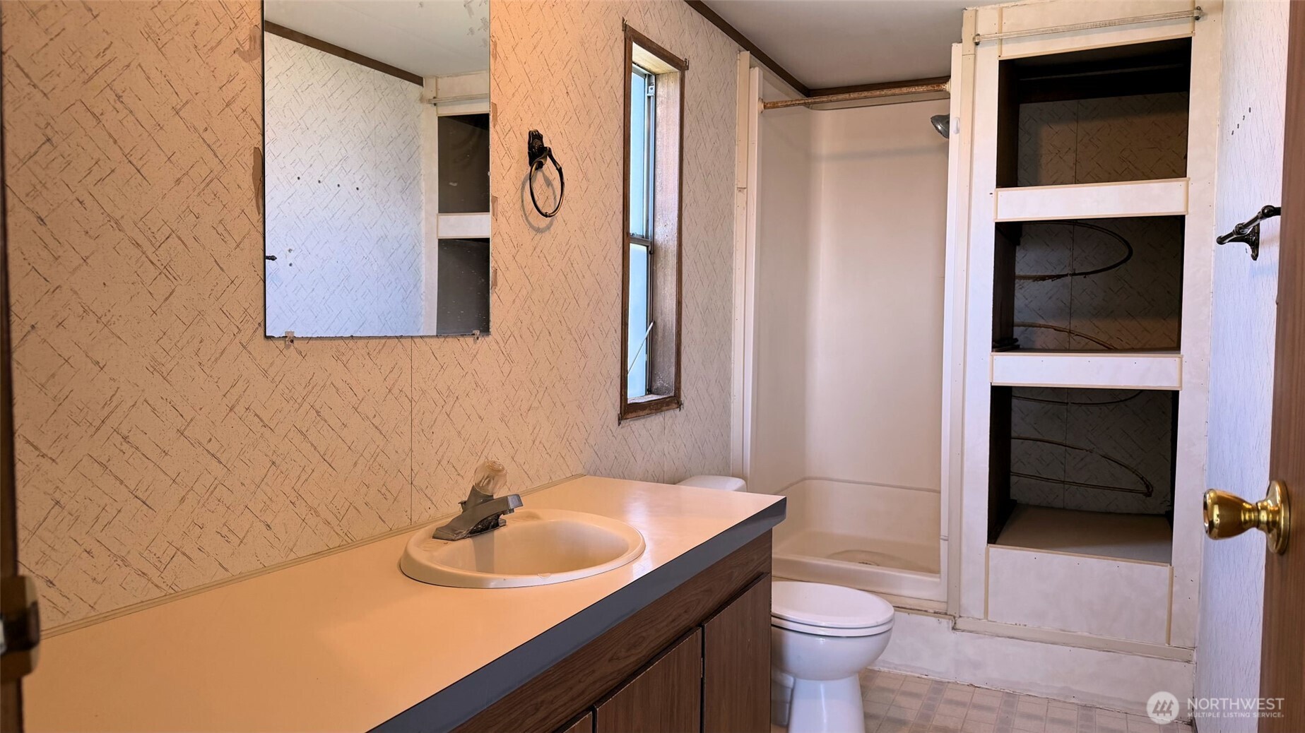 1210 2nd Street Davenport, WA 99122 - Photo 11 of 19 a bathroom with a sink and a toilet
