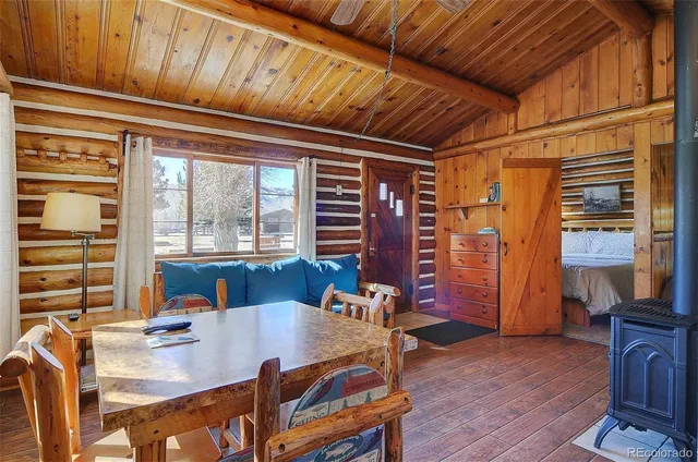 a livingroom with furniture and window
