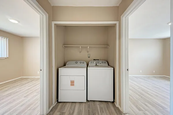 a utility room with dryer and washer