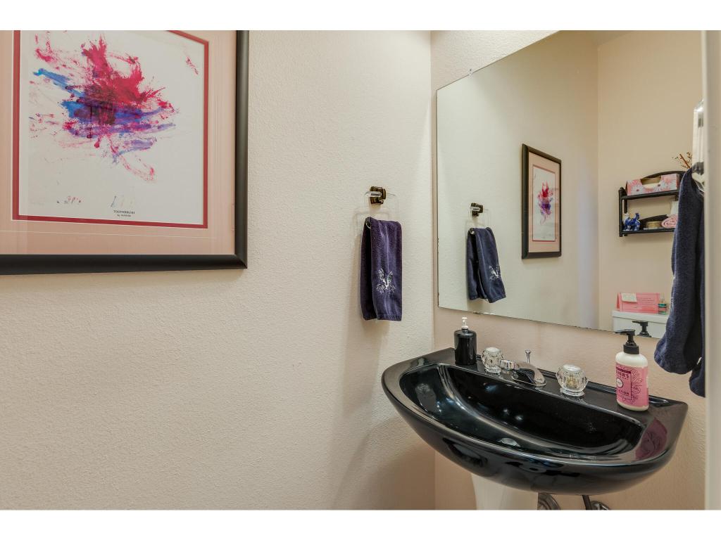 1602 Wild Basin Ledge Austin, TX 78746 - Photo 17 of 40 a bathroom with a sink and a mirror