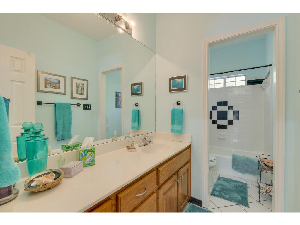 1602 Wild Basin Ledge Austin, TX 78746 - Photo 22 of 40 a bathroom with a sink double vanity and a mirror