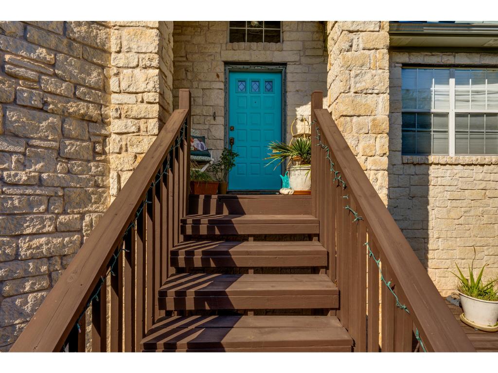 1602 Wild Basin Ledge Austin, TX 78746 - Photo 32 of 40 a view of entryway with wooden floor and stairs