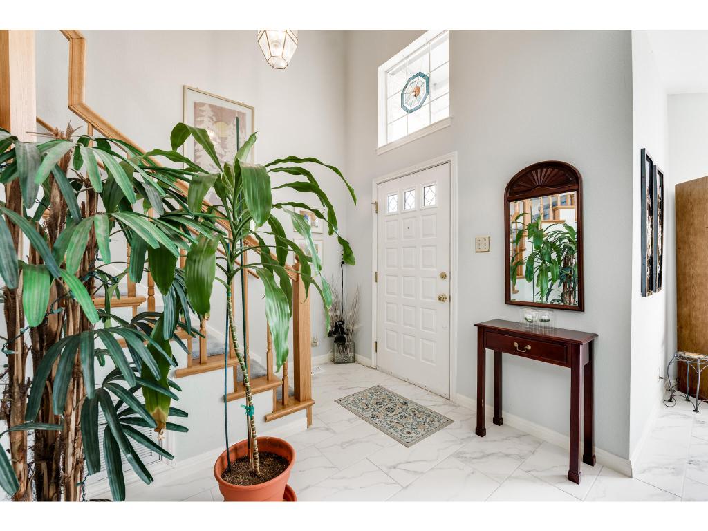 1602 Wild Basin Ledge Austin, TX 78746 - Photo 4 of 40 a view of entryway with paintings on the wall