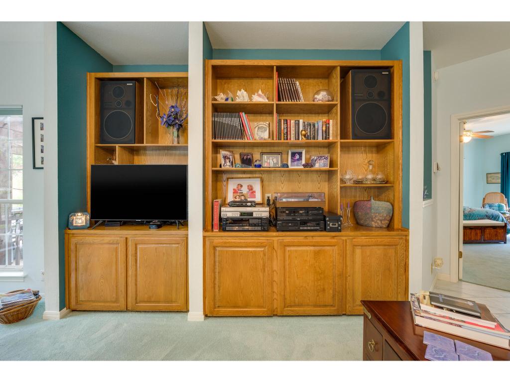 1602 Wild Basin Ledge Austin, TX 78746 - Photo 10 of 40 a living room with fish tank and a flat screen tv