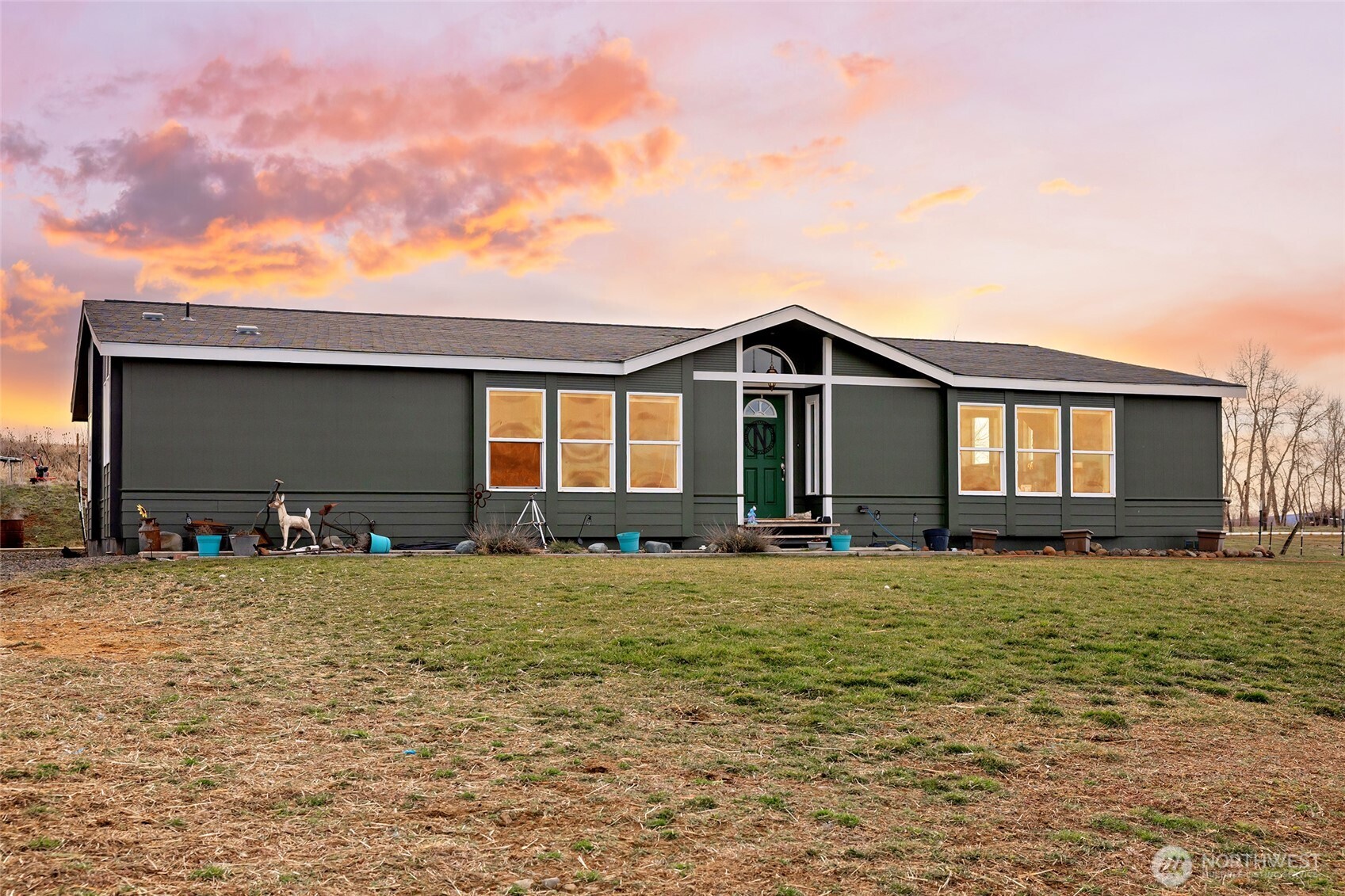 2416 Clerf Road Ellensburg, WA 98926 - Photo 1 of 35 a front view of a house with yard and porch