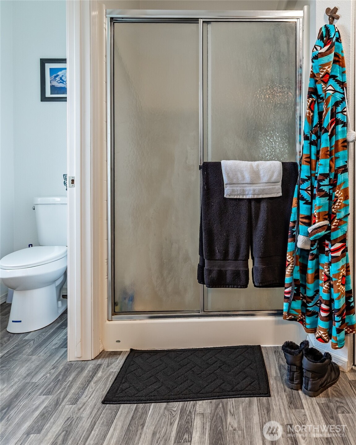 2416 Clerf Road Ellensburg, WA 98926 - Photo 19 of 35 a bathroom with a toilet and a shower curtain