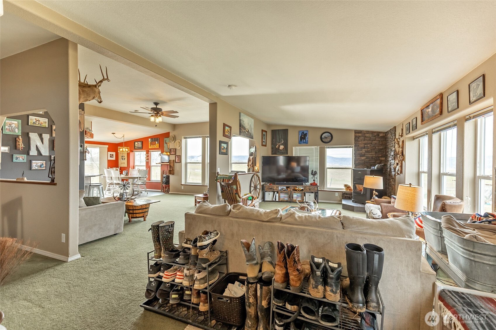 2416 Clerf Road Ellensburg, WA 98926 - Photo 3 of 35 a living room with lots of furniture and a large window
