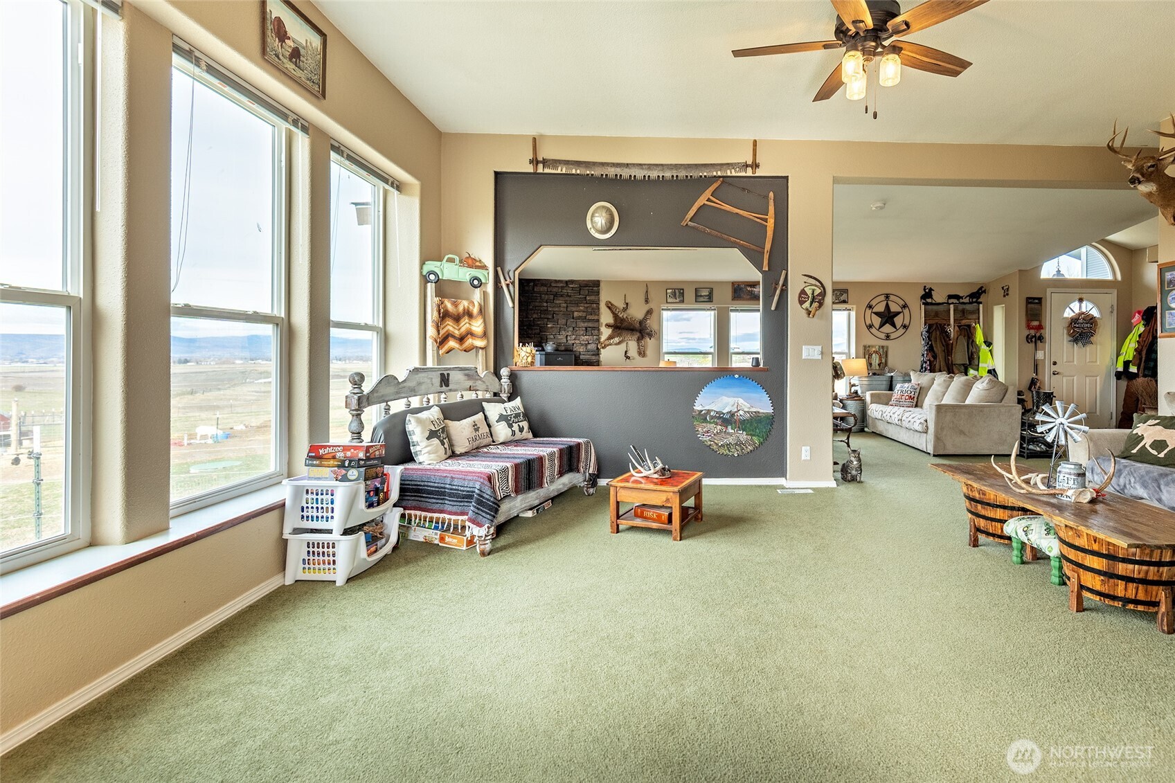 2416 Clerf Road Ellensburg, WA 98926 - Photo 6 of 35 a living room with furniture and a floor to ceiling window