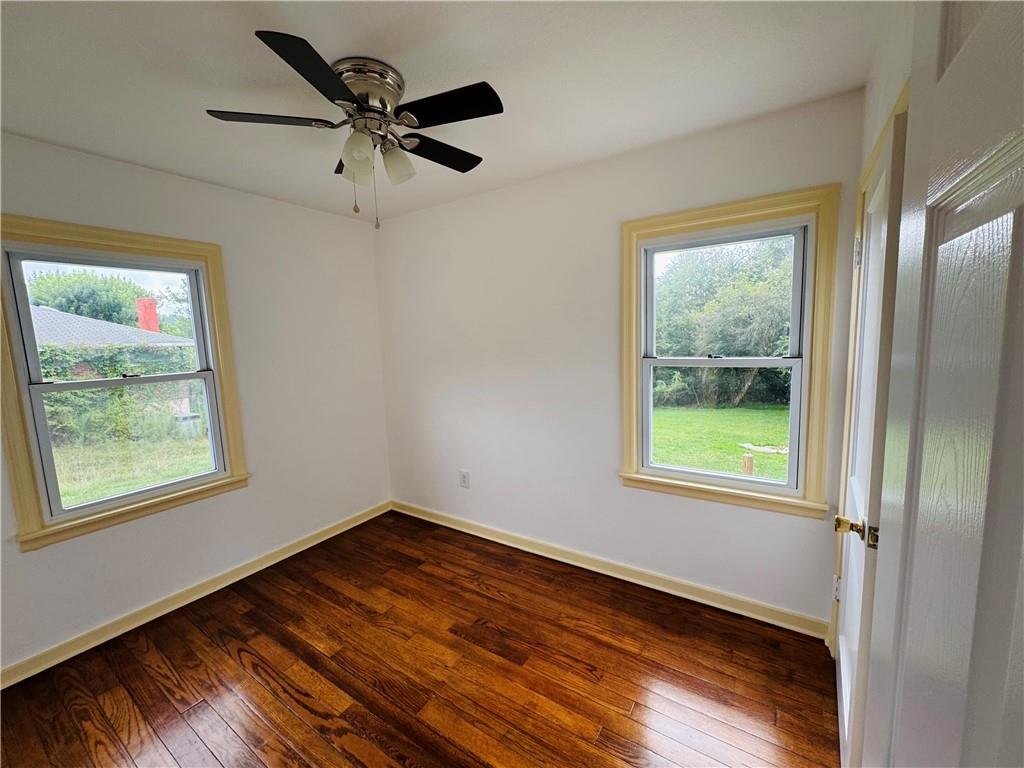 1248 Saltsburg Road Export, PA 15632 - Photo 12 of 44 a view of an empty room with wooden floor and a window
