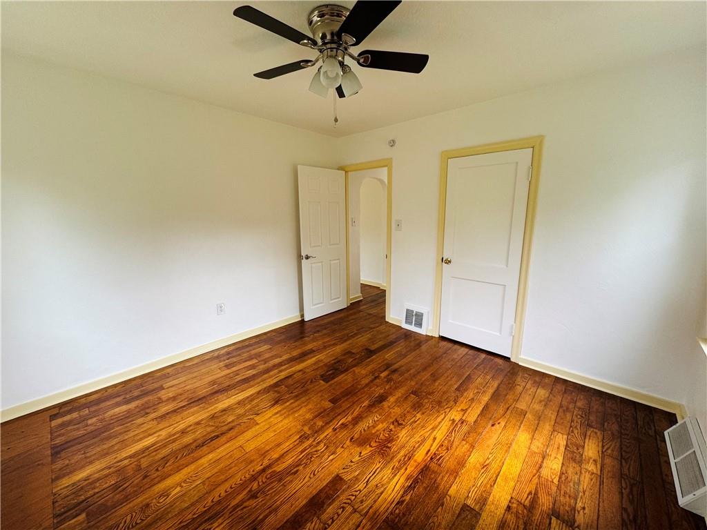 1248 Saltsburg Road Export, PA 15632 - Photo 13 of 44 a view of empty room with wooden floor and fan