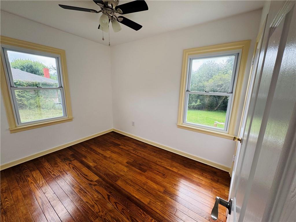 1248 Saltsburg Road Export, PA 15632 - Photo 14 of 44 a view of an empty room with wooden floor and a window