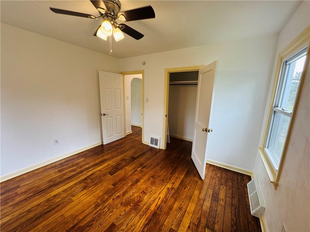 1248 Saltsburg Road Export, PA 15632 - Photo 19 of 44 wooden floor in an empty room with a window