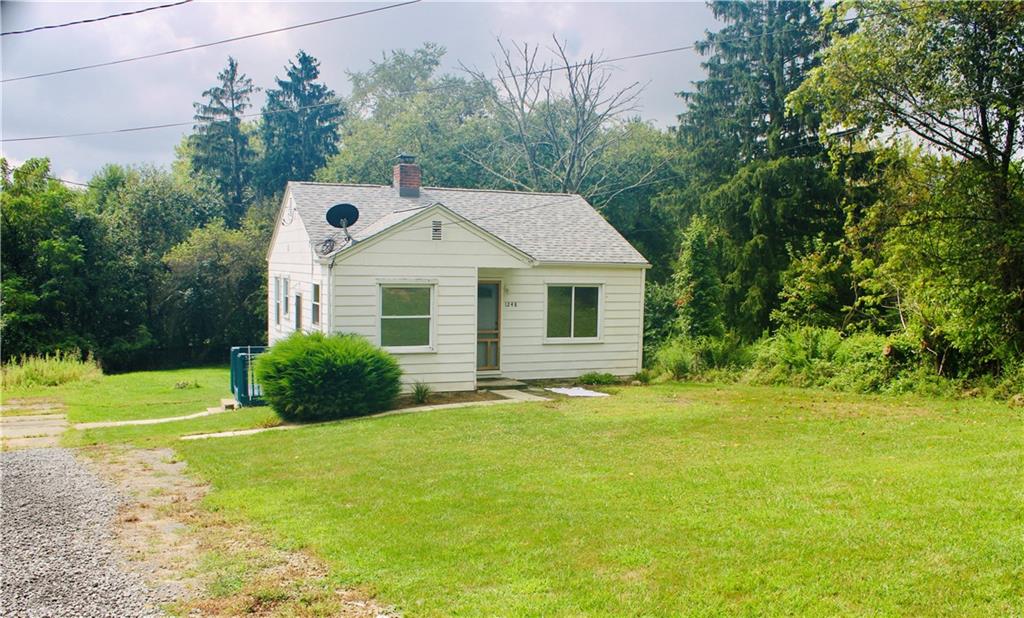 1248 Saltsburg Road Export, PA 15632 - Photo 3 of 44 a front view of a house with a yard