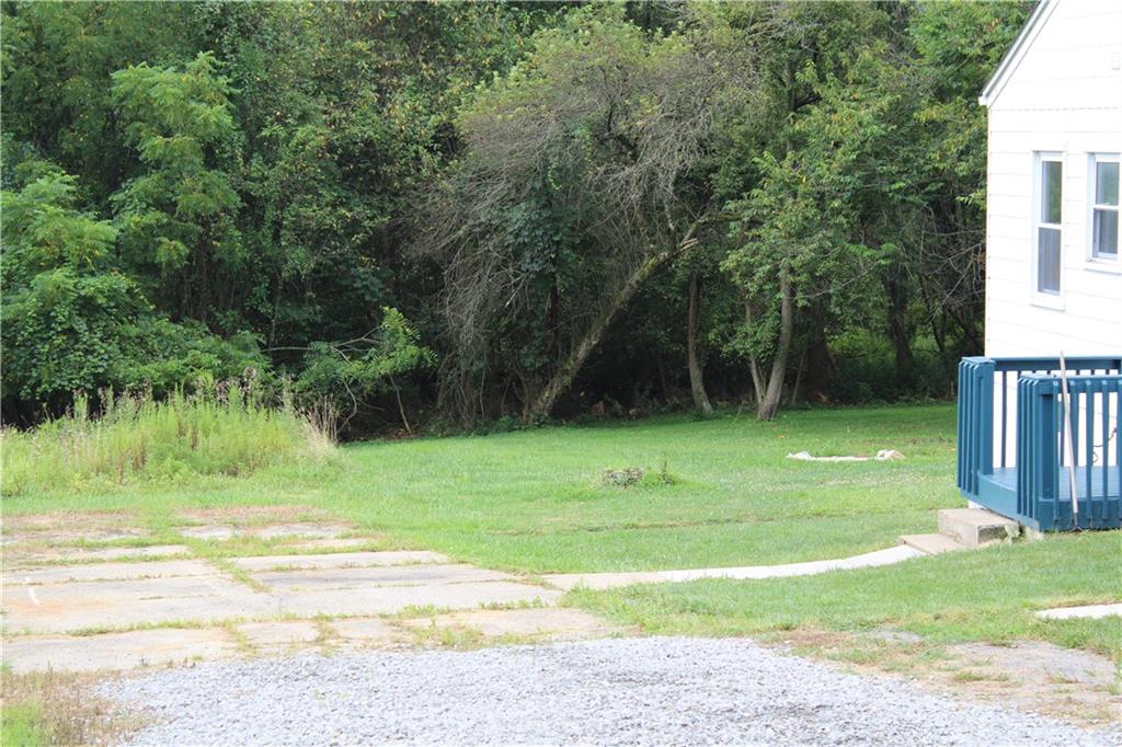 1248 Saltsburg Road Export, PA 15632 - Photo 37 of 44 a view of a golf course with a lake