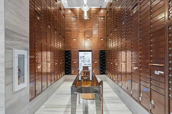 a view of a balcony with wooden floor and fence