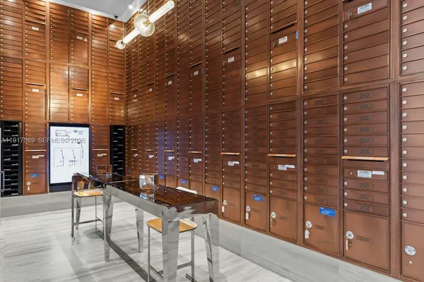 a view of a swimming pool with furniture