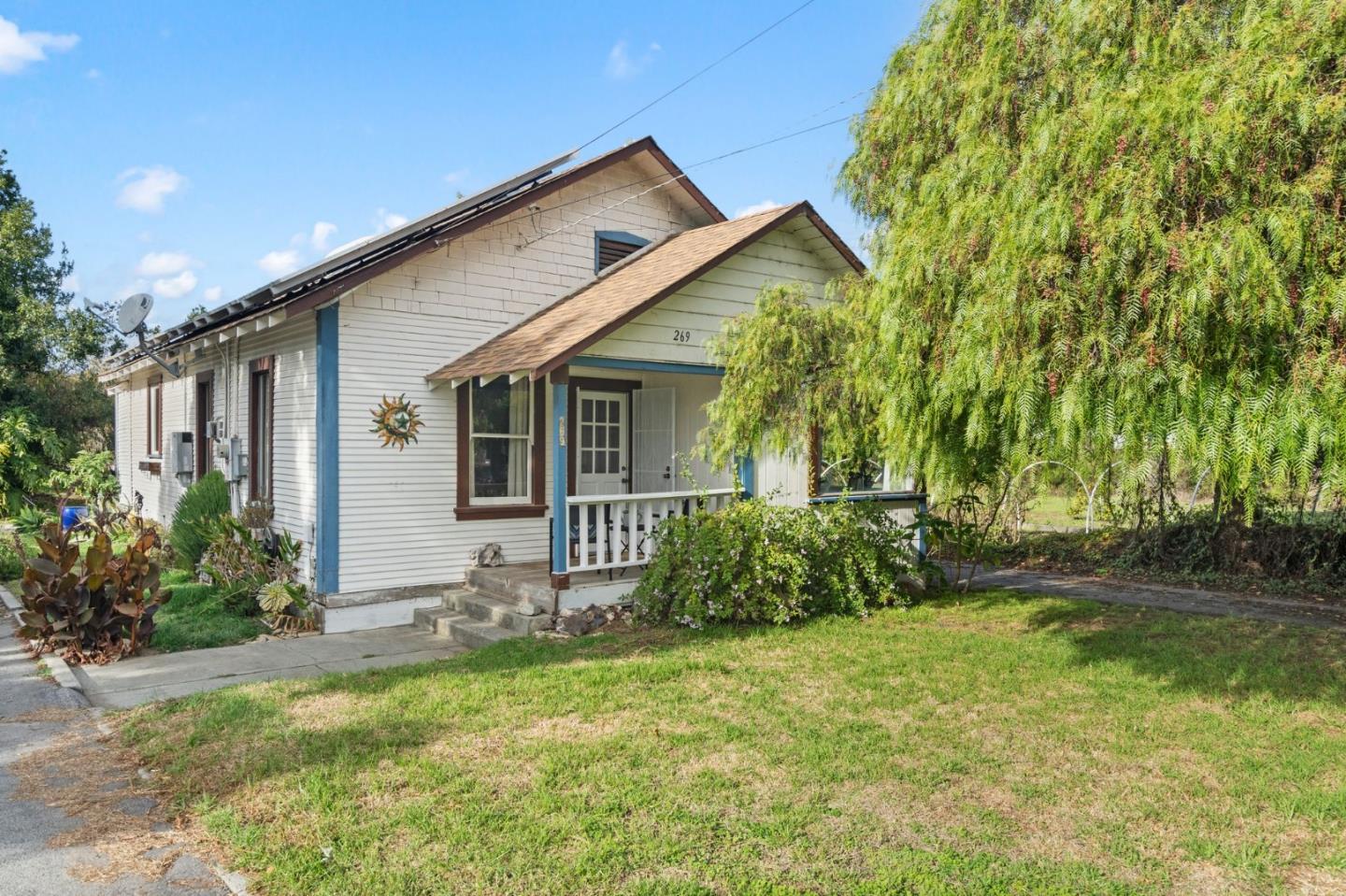 269 Marcus Street Aromas, CA 95004 - Photo 1 of 18 a view of a house with backyard and garden
