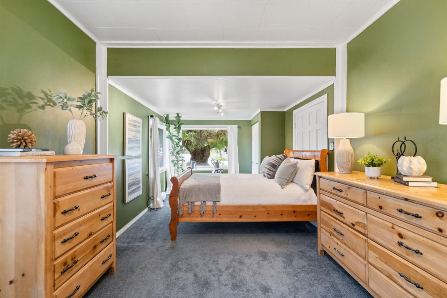 269 Marcus Street Aromas, CA 95004 - Photo 11 of 18 a bedroom with a bed and a dresser