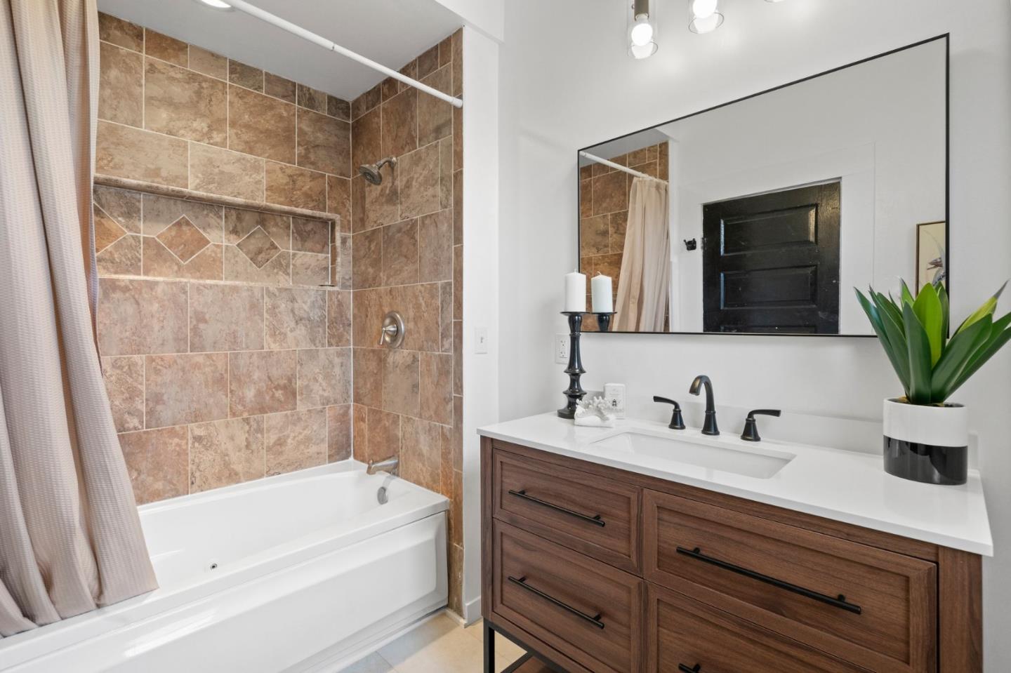 269 Marcus Street Aromas, CA 95004 - Photo 13 of 18 a bathroom with a tub a sink and mirror