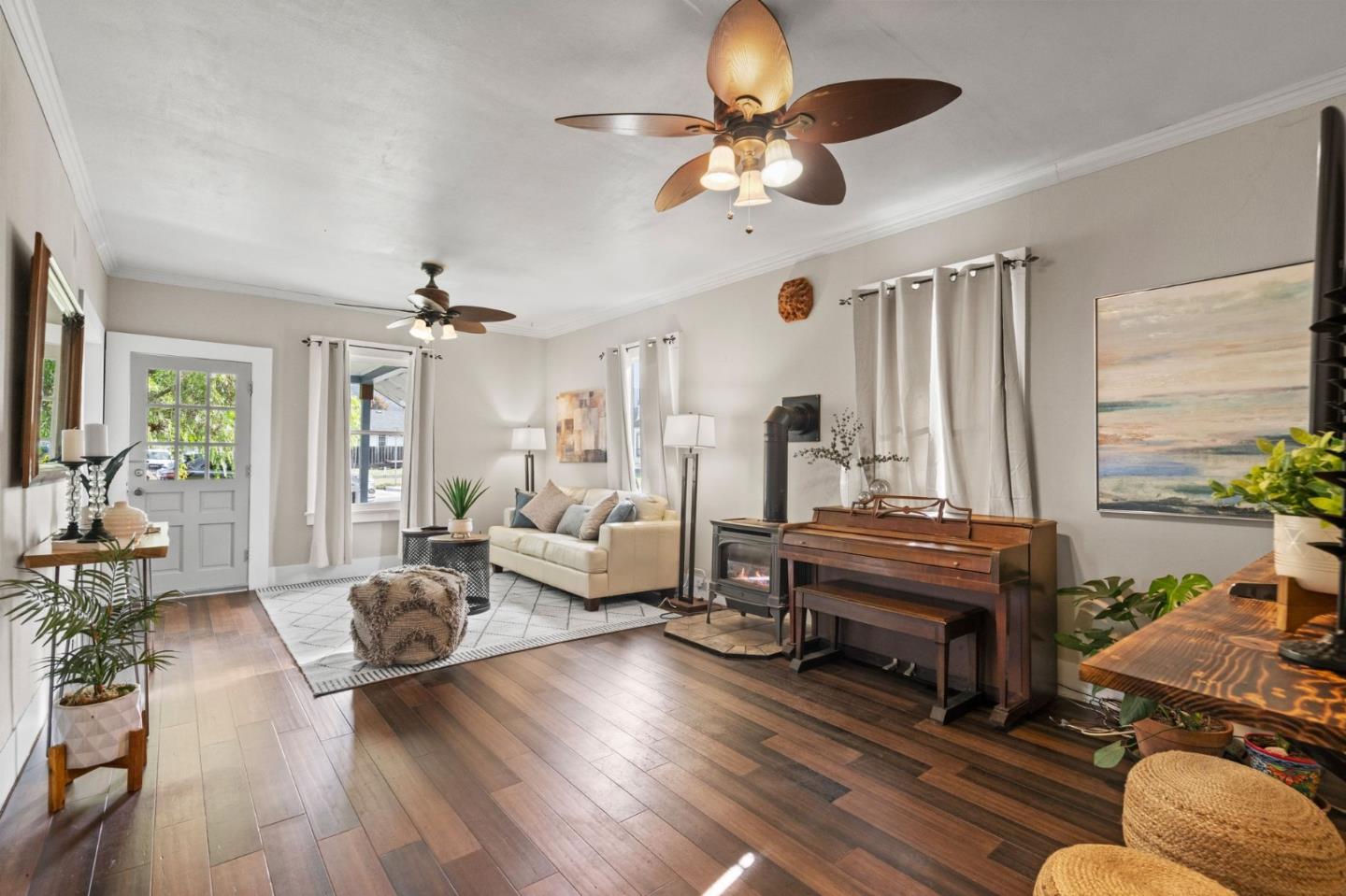269 Marcus Street Aromas, CA 95004 - Photo 5 of 18 a living room with furniture a fireplace and wooden floor
