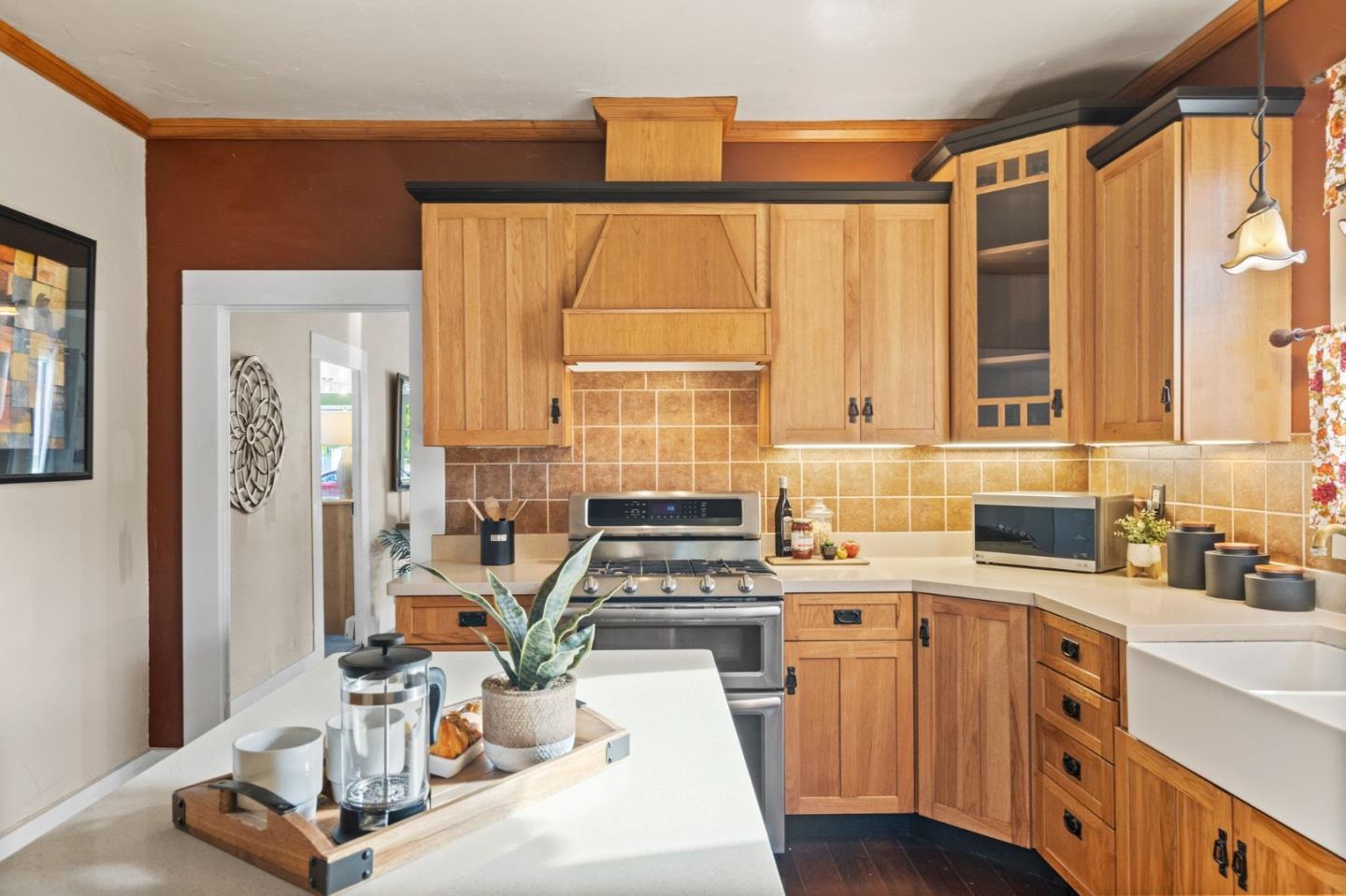 269 Marcus Street Aromas, CA 95004 - Photo 9 of 18 a kitchen with a sink stove and cabinets