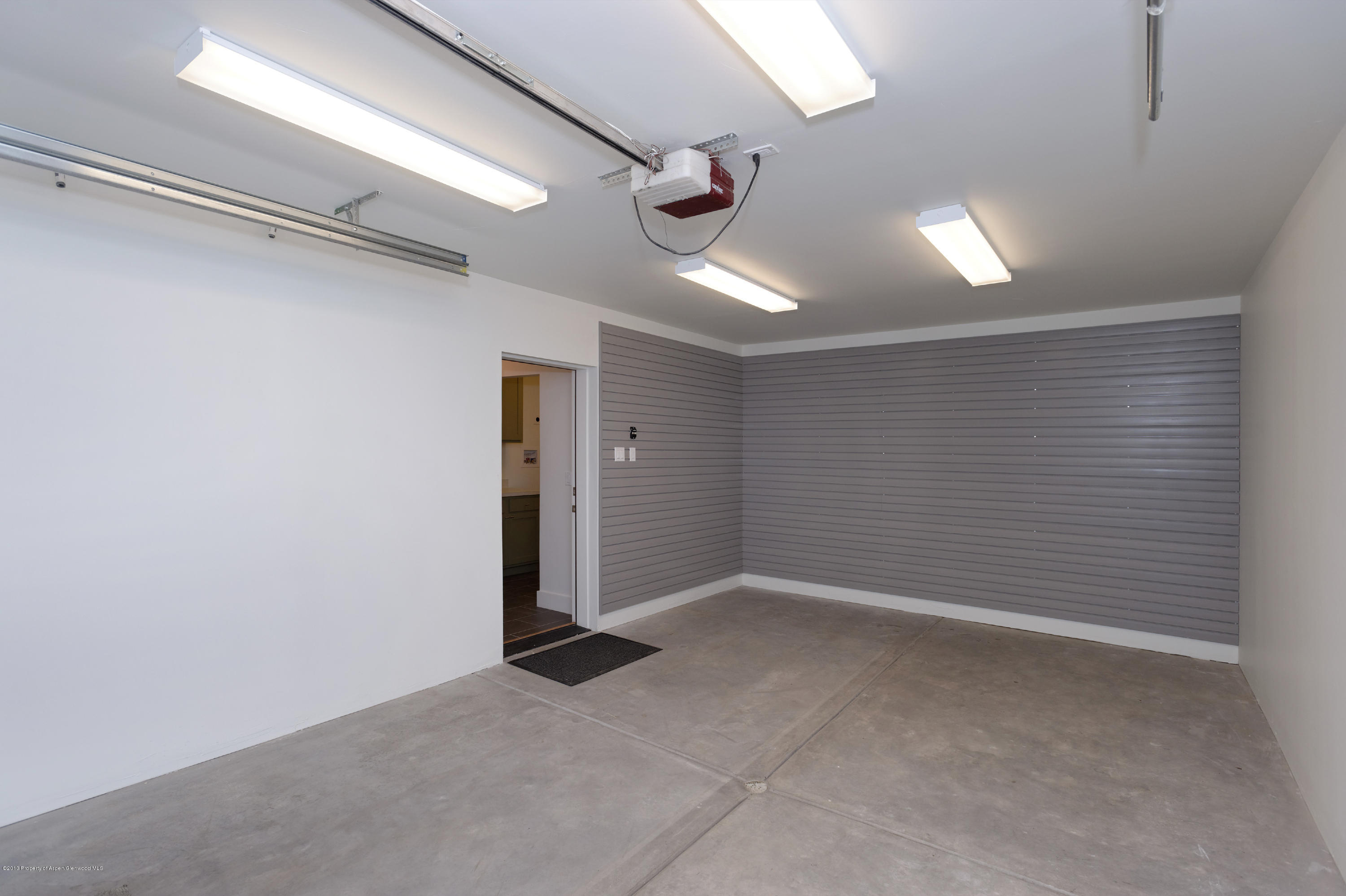 222 Meadow Road Snowmass Village, CO 81615 - Photo 18 of 21 Garage/ Shelving System Wall