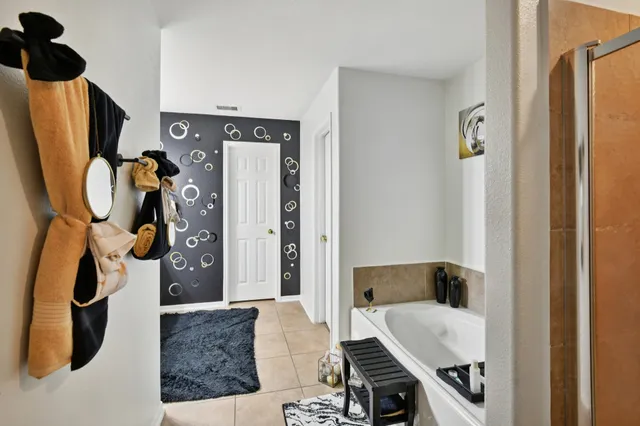 a view of living room with furniture and entryway