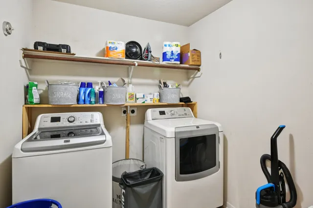 a utility room with dryer and washer